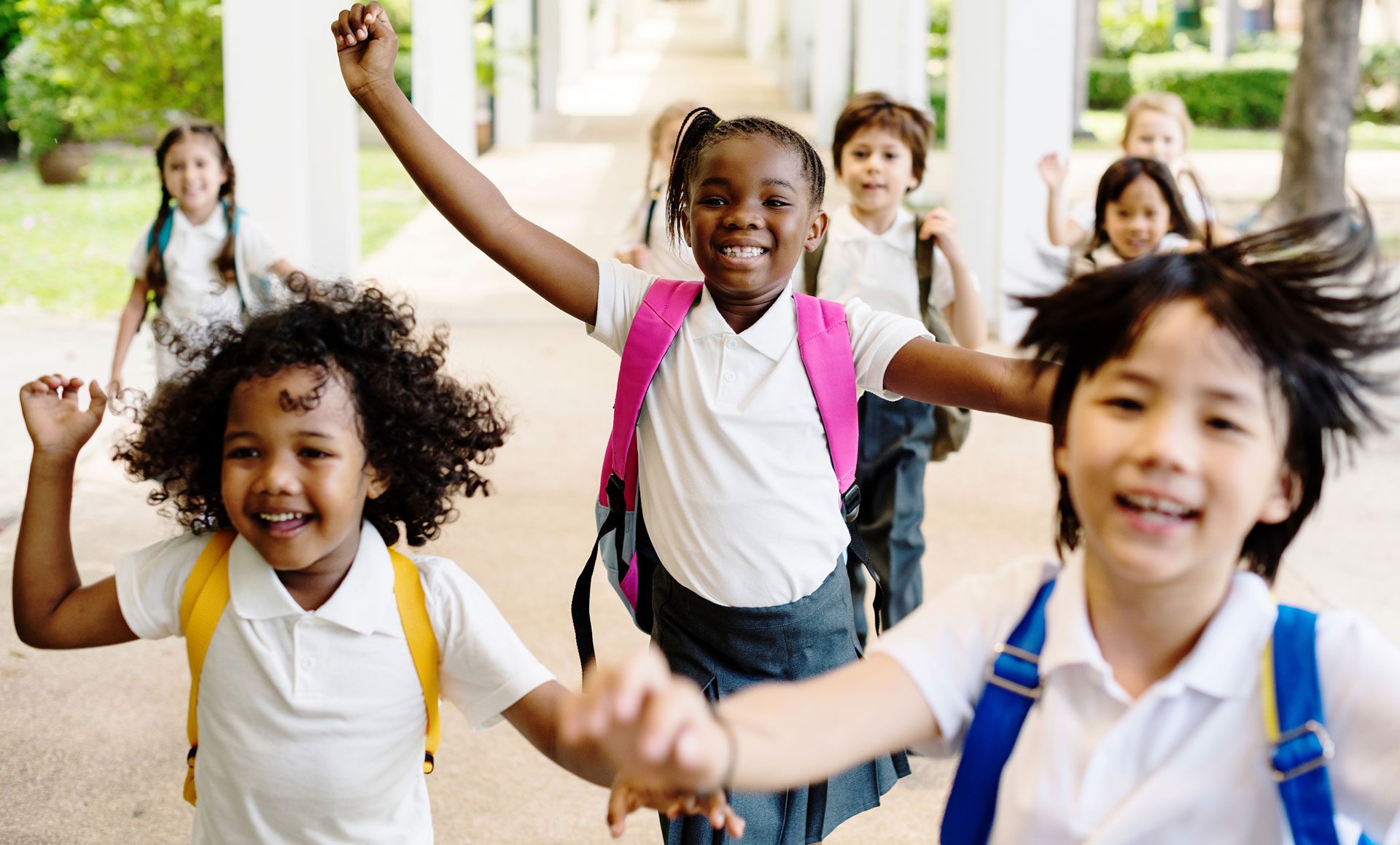 happy children running toward camera