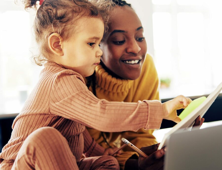 child and parent reading