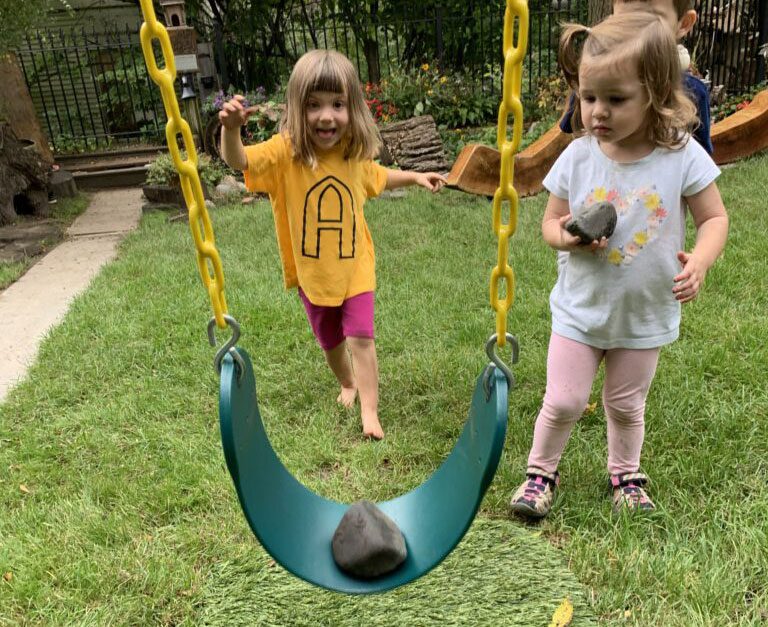 children playing on swing